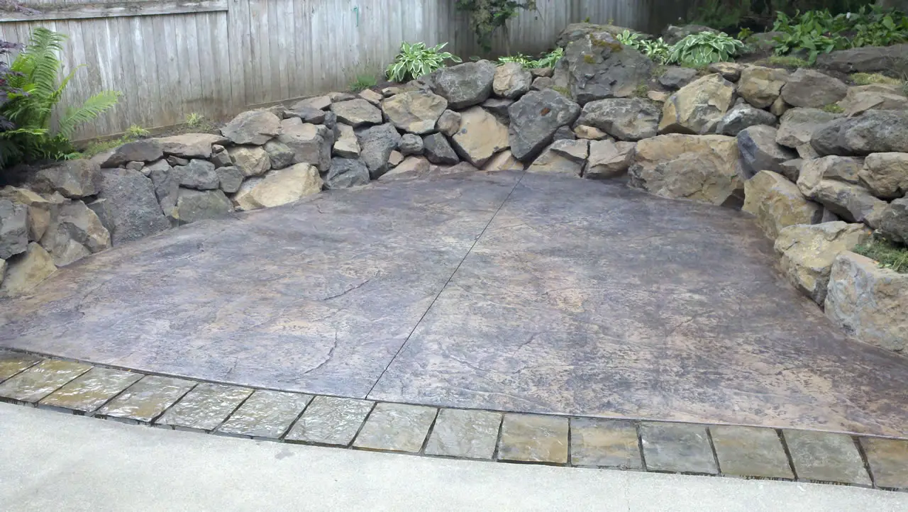 Stamped patio with a paver-style border