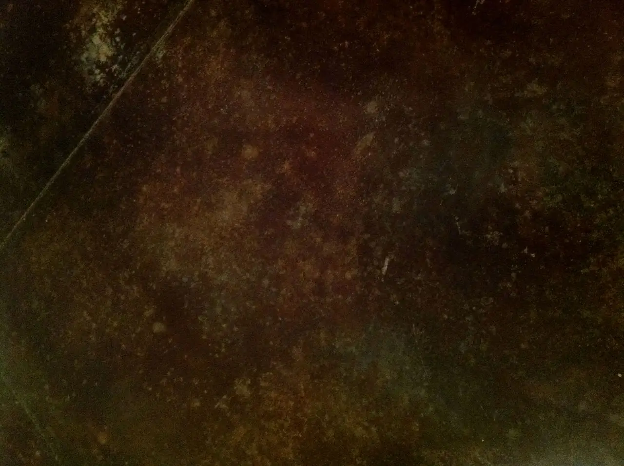 Dark acid-stained floor close-up